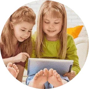 Image of a child using a tablet device for cognitive stimulation and therapeutic purposes